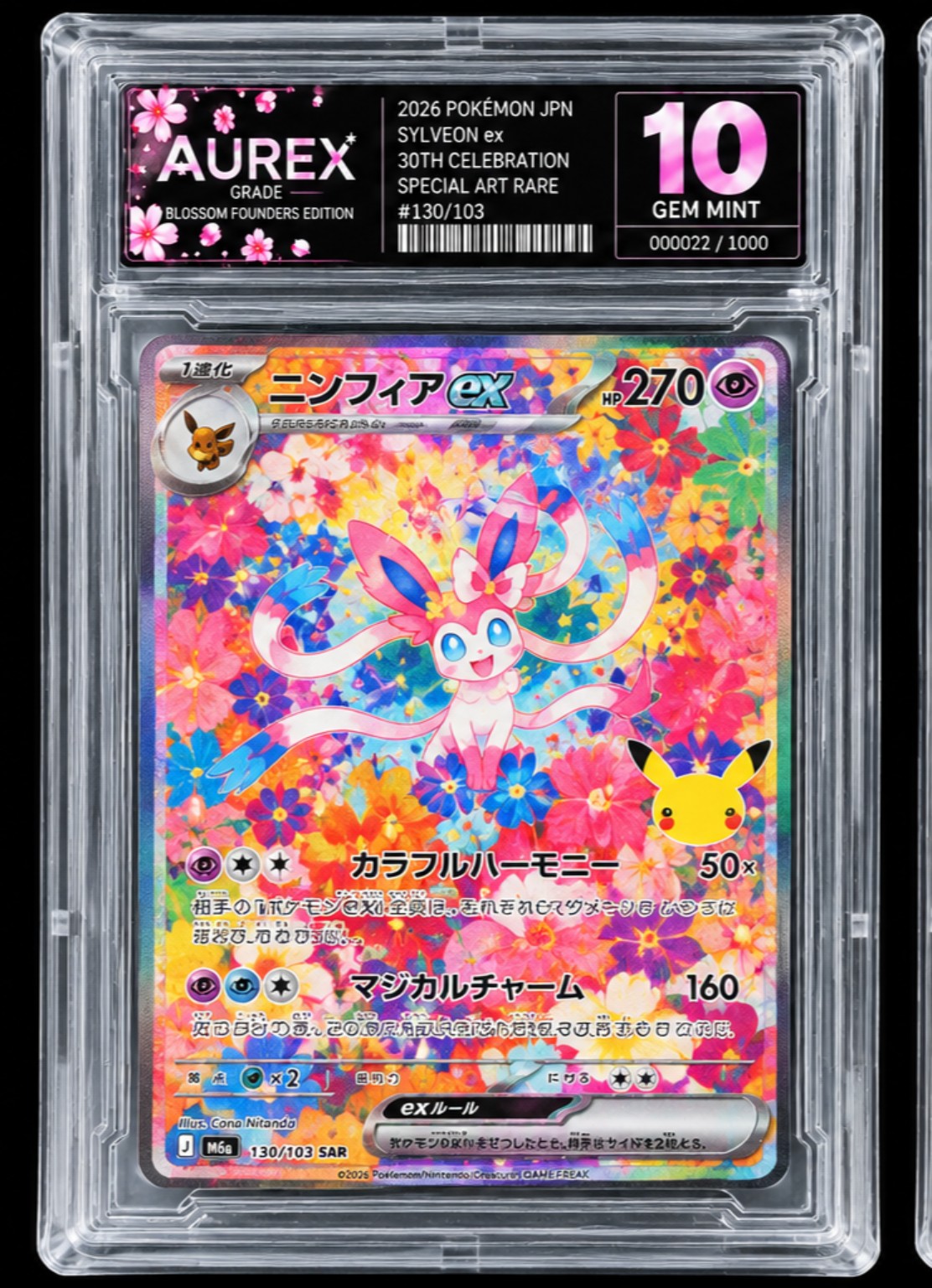 Real AXG graded Sylveon ex card used to demonstrate visual inspection areas